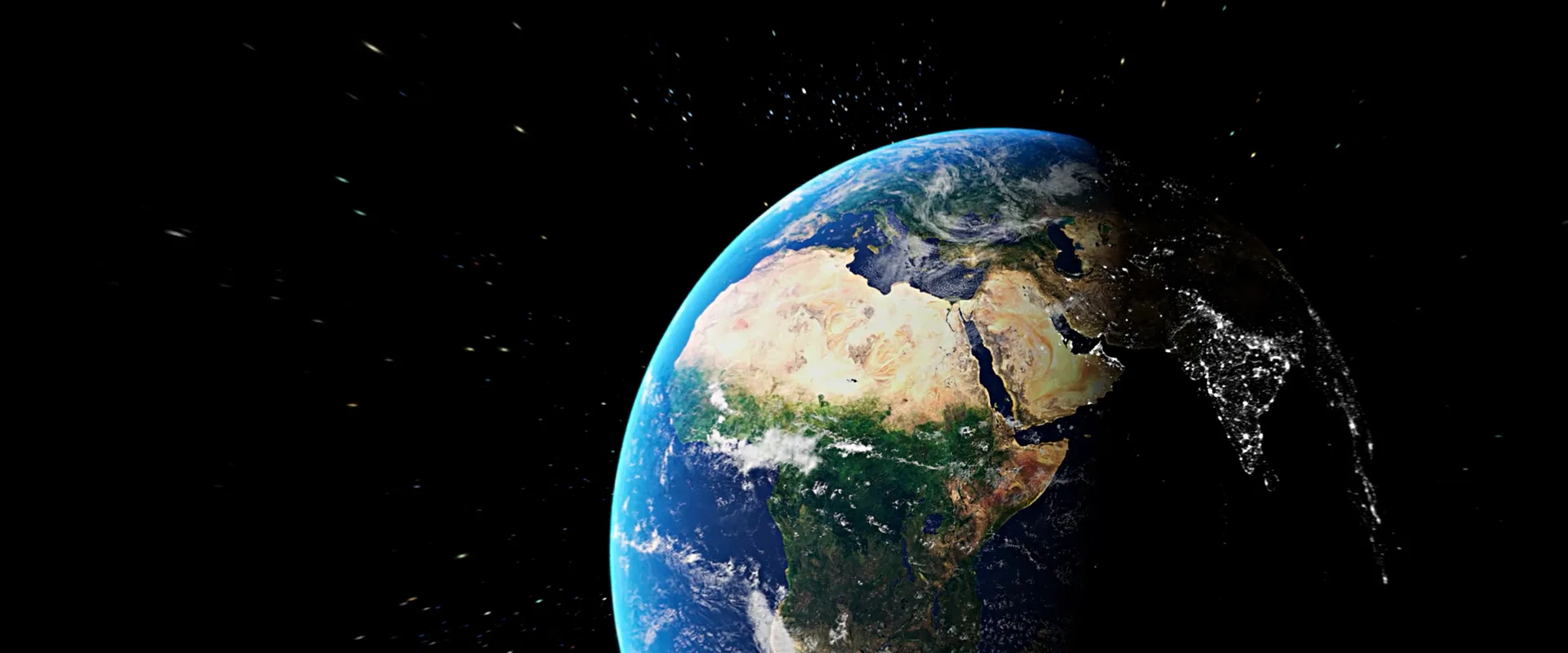Earth from orbit: the blue planet on the far wall, the Moon small on the wall behind