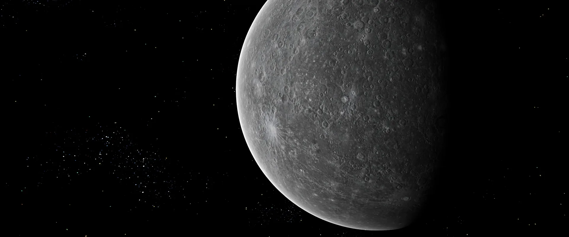 Mercury from orbit: the grey cratered globe, half in shadow