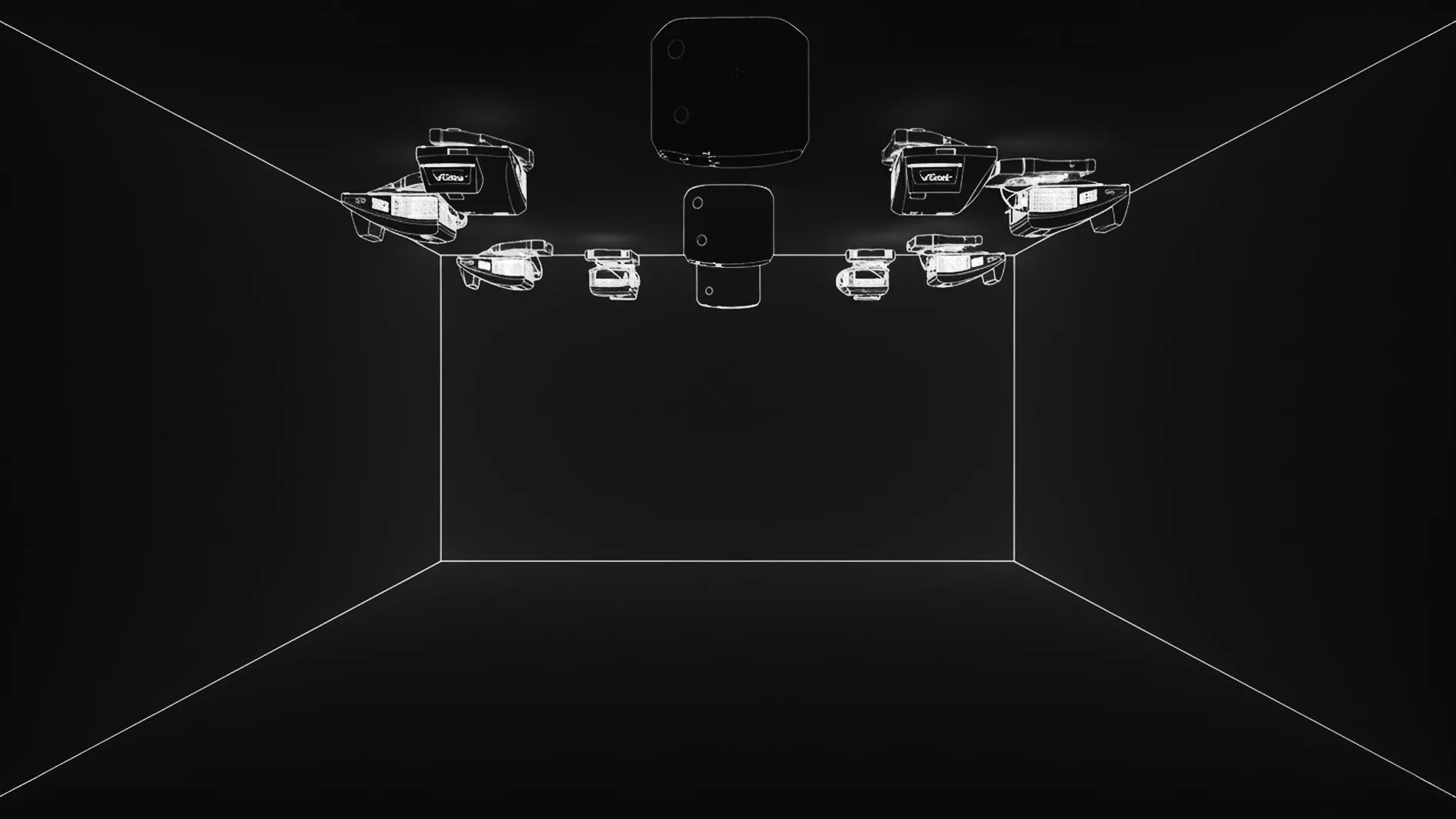 Wireframe diagram of the room: twelve ceiling-mounted projectors covering the walls and floor, fed by one workstation with three graphics cards